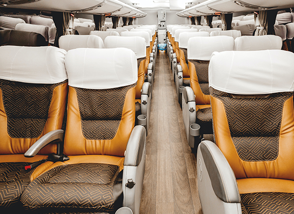 Charter bus with reclining seats for large groups
